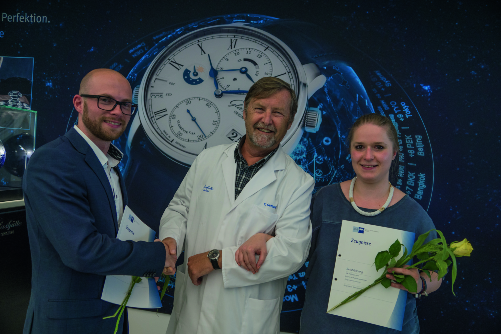 Glashütte original ceo yann gamard with the two best graduates of 2016 birgit schönfeldt and robert löwe