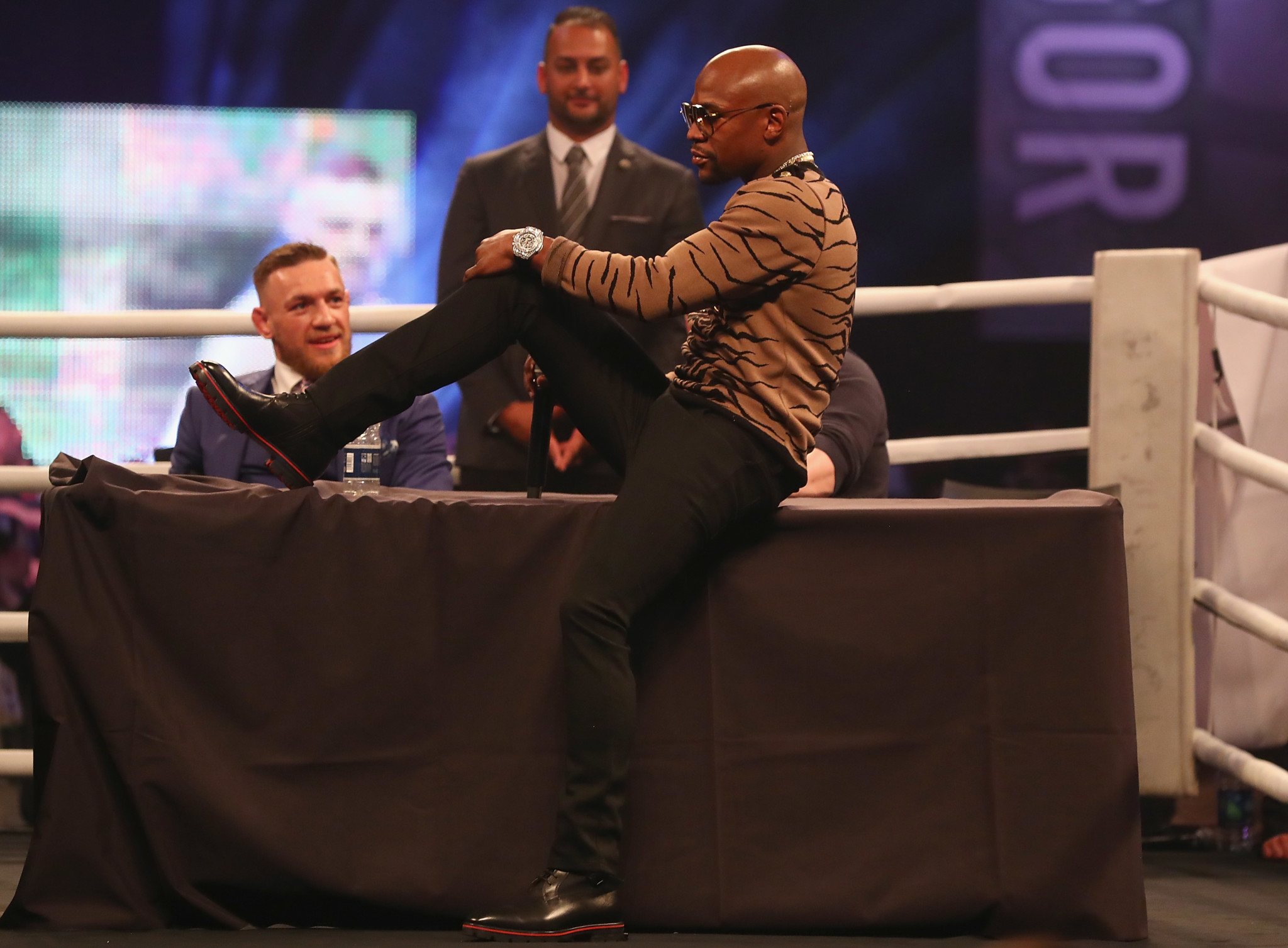 Floyd mayweather taunts connor mcgregor at a london press conference, waving what he says is a $1. 4 million hublot big bang in the face of his opponent. (photo by matthew lewis/getty images)