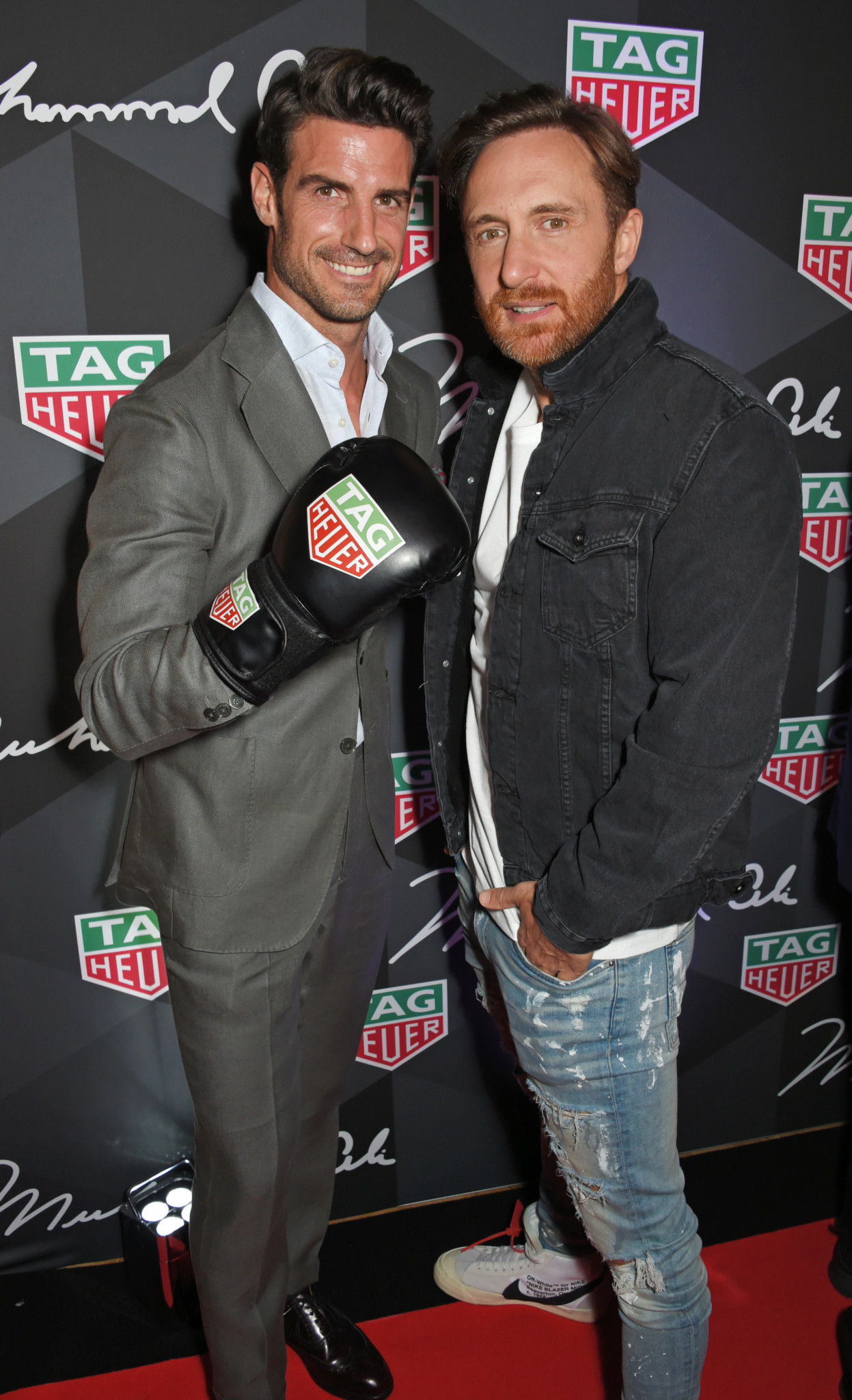 London, england - october 10:  aitor ocio (l) and david guetta attend the launch of the tag heuer muhammad ali limited edition timepieces at bxr gym on october 10, 2017 in london, england. Pic credit: dave benett