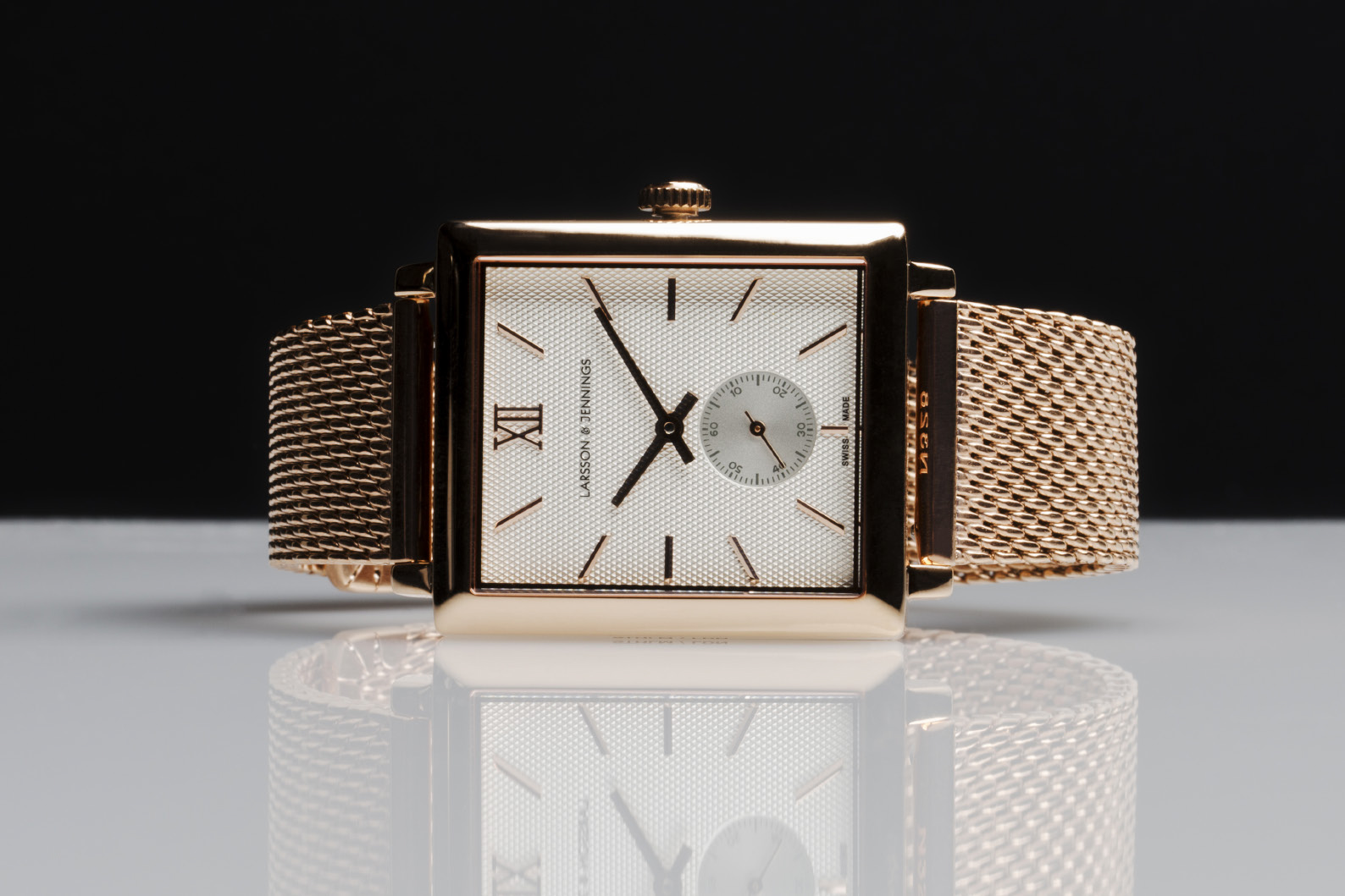 Larsson & jennings has produced a gold-coloured automatic with a square dial.