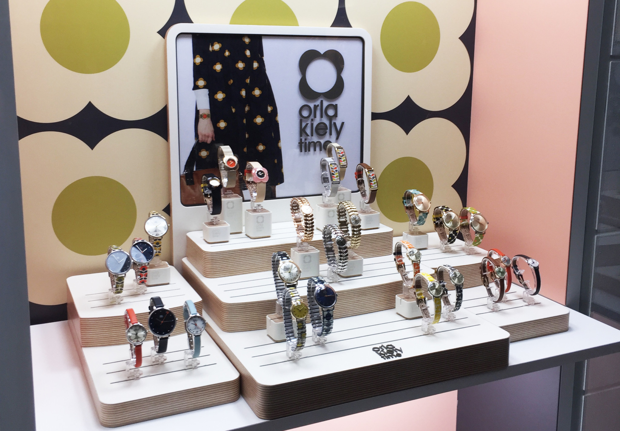 A promotional display for orla kiely watches produced by redd retail group.