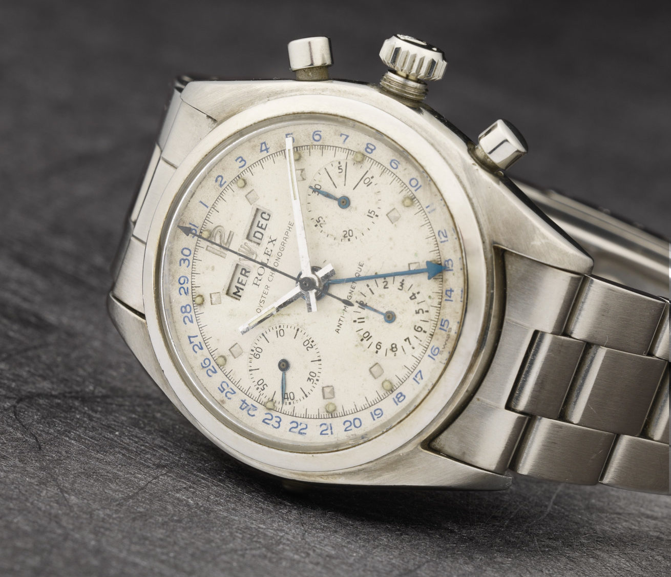 Rolex. A rare stainless steel manual wind triple calendar chronograph bracelet watch