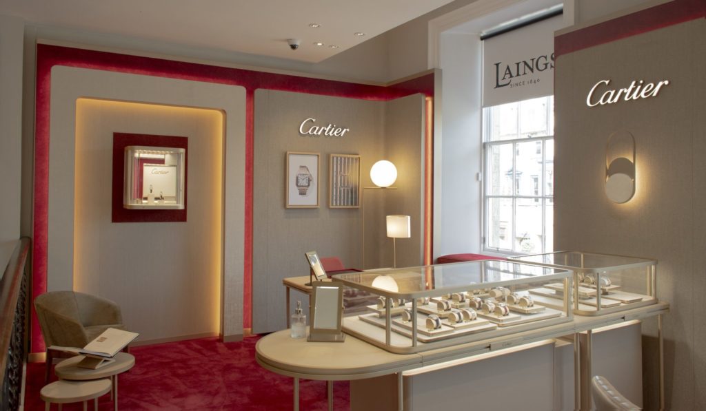 Laings edinburgh cartier store in store combines its signature red with the finishing touches of parisian elegance