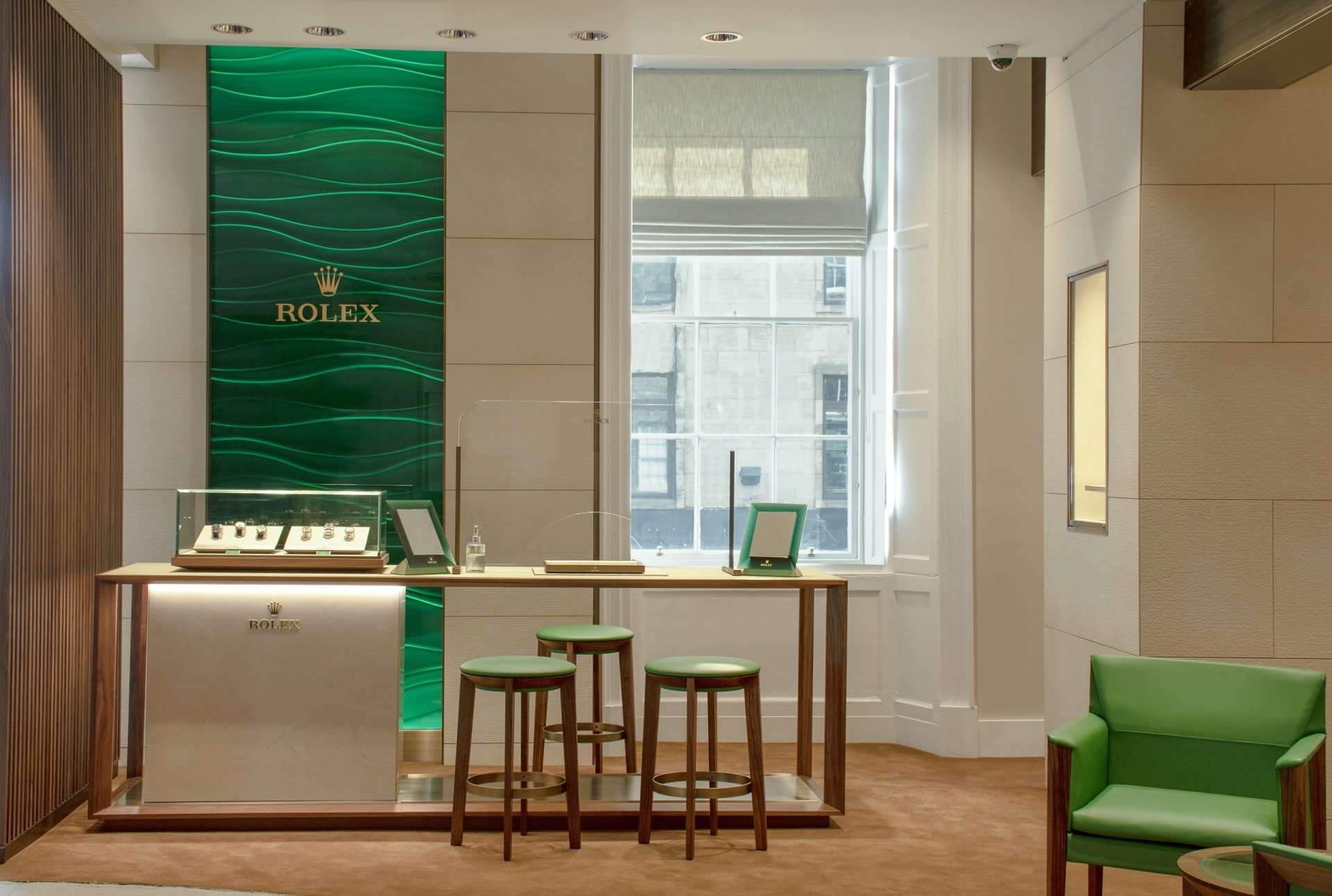 Laings edinburgh rolex shop in shop welcomes clients with the rich emerald green and gold associated with the iconic brand
