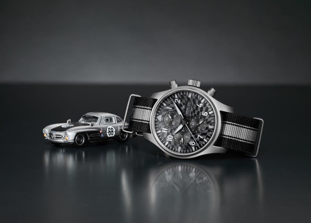 Offered for charity a limited edition titanium iwc chronograph wristwatch and mattel hot wheels model car in a unique collectors set