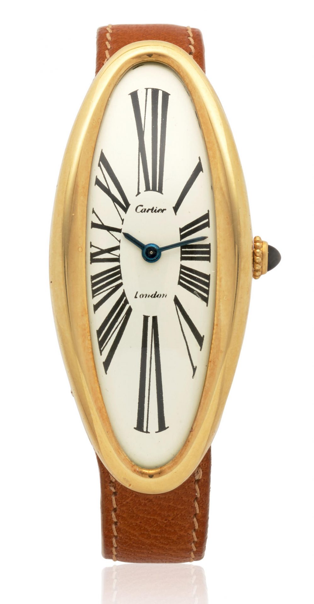 Cartier. A rare oversized 18k gold manual wind oval wristwatch