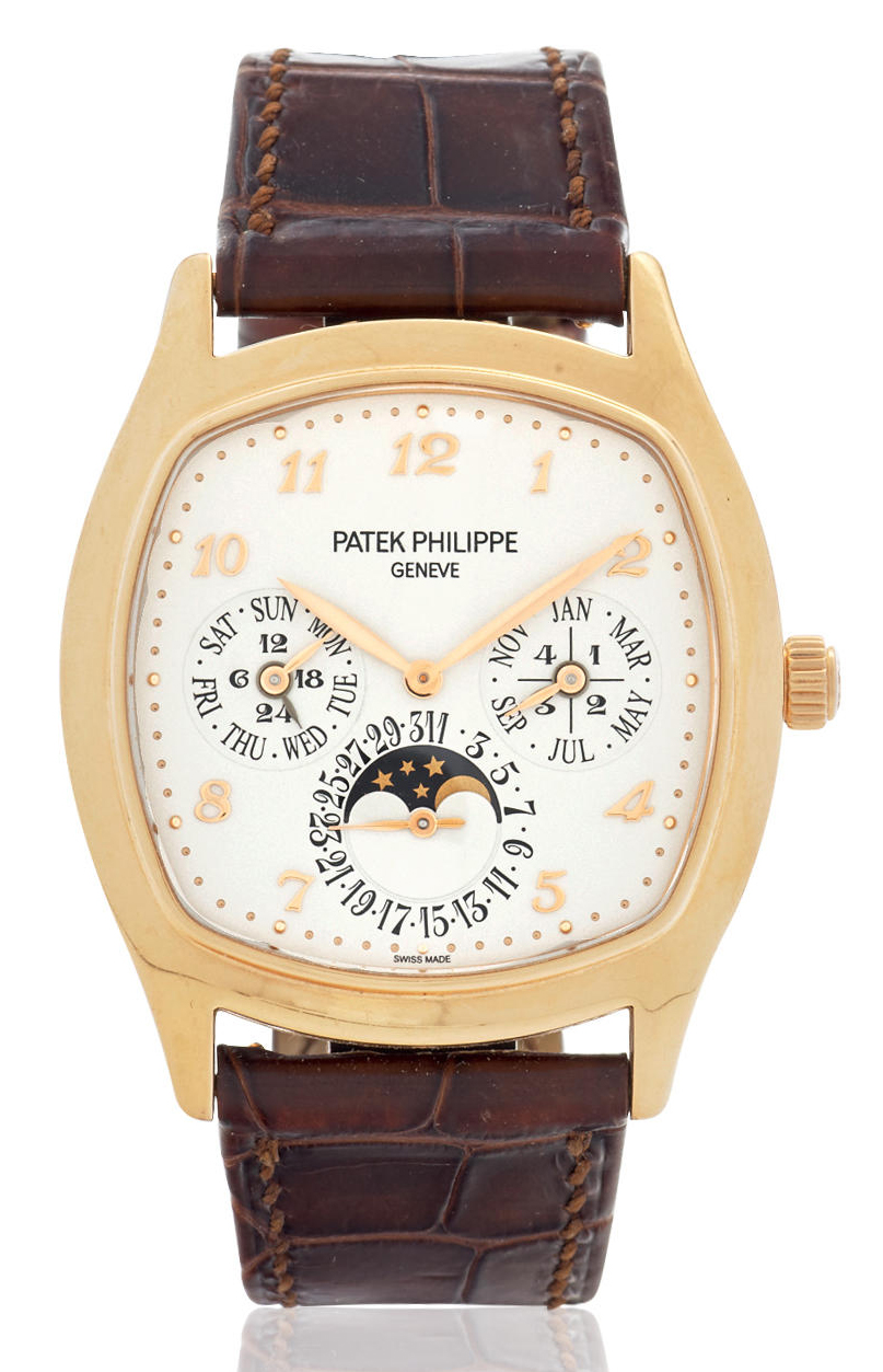 Patek philippe. A fine 18k gold automatic perpetual calendar wristwatch with moonphase and leap year indication
