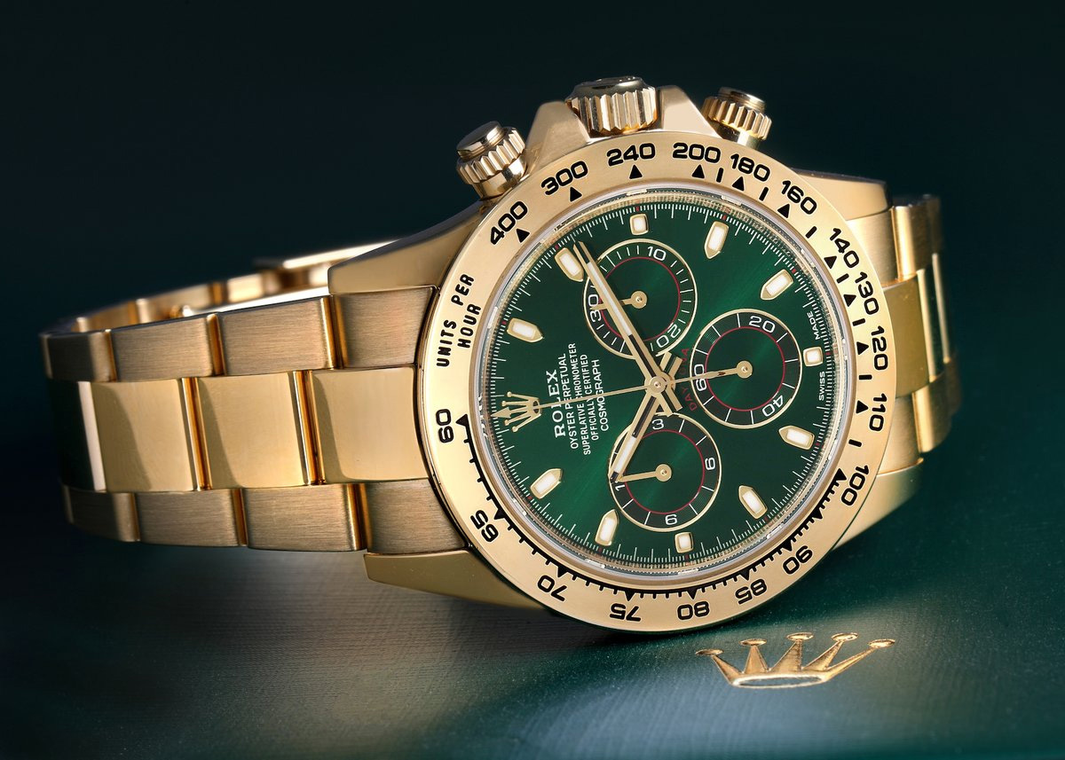 Rolex daytona 116508 gold and green