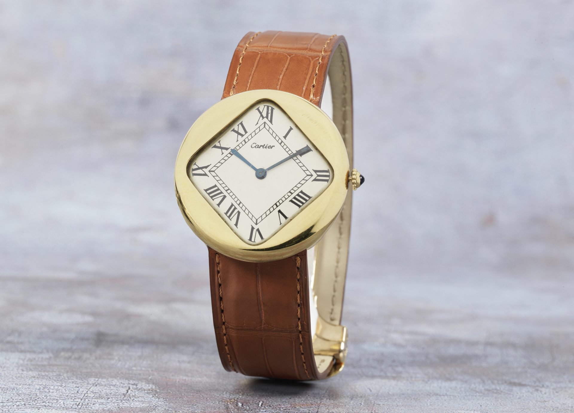 A rare 18k gold cartier ‘pebble wristwatch