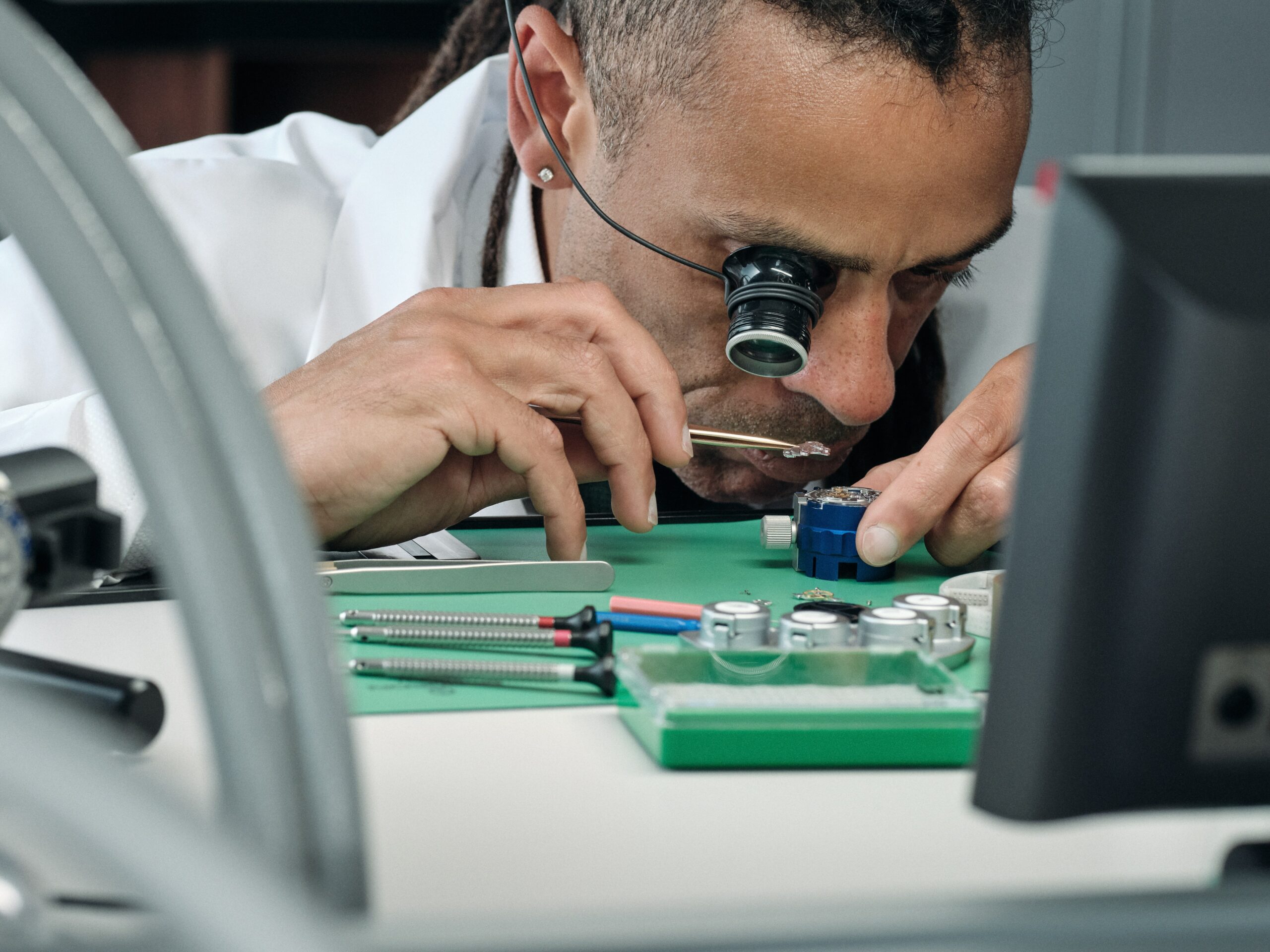 A watchmaker at the whittles preston rolex authorised service centre scaled