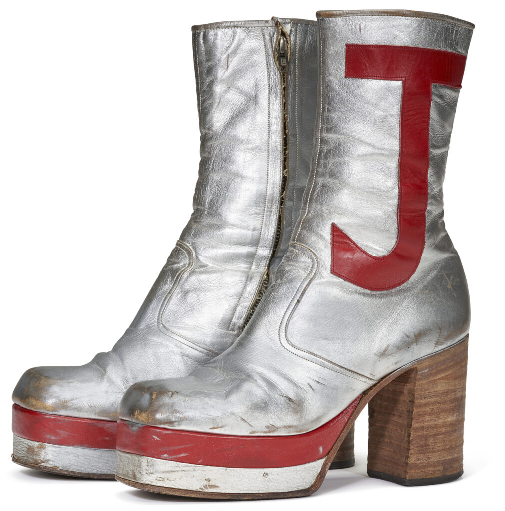 A pair of silver leather tall platform boots circa 1971