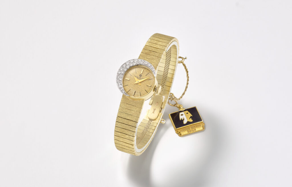 Bonhams a baume mercier gold and diamond engraved watch